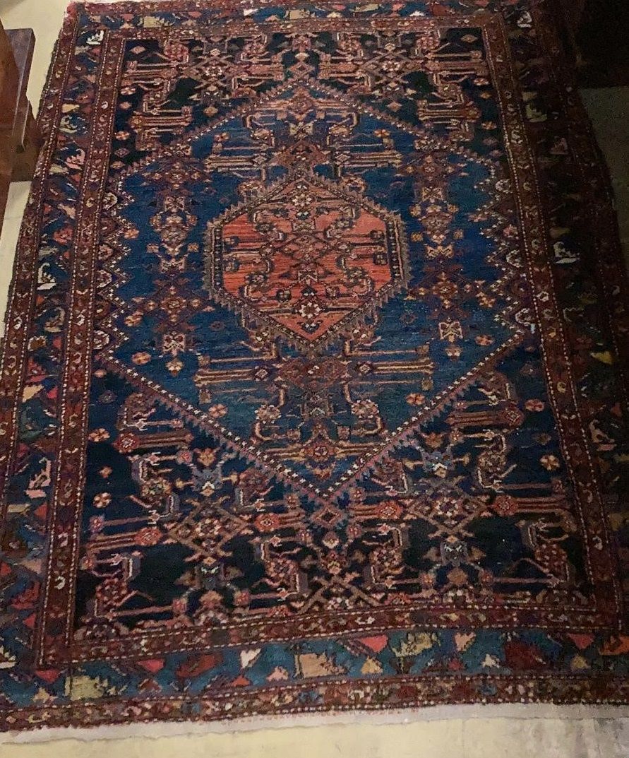 A Kurdish blue ground rug, 198 x 135cm